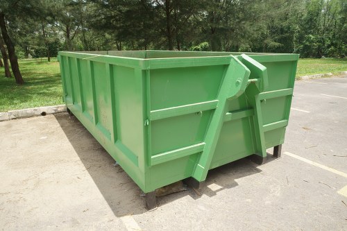 Front view of a skip on a street representing skip hire operations